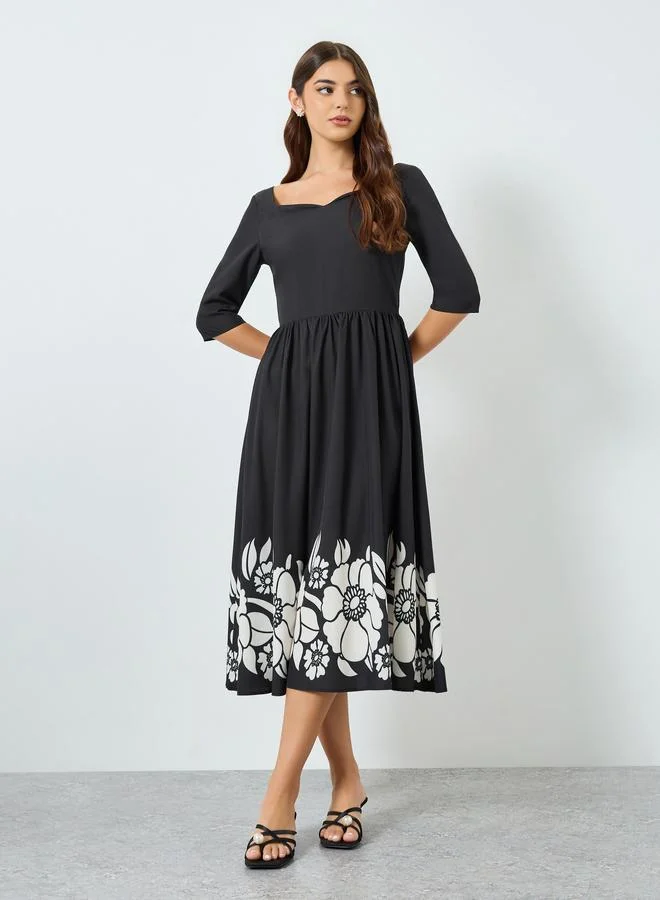 ستايلي فستان ميدي بحافة واسعة بطبعة أزهار